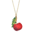 Close-up of handmade red apple seed bead pendant on a delicate gold metal chain - Red Apple Style (XN179-4)