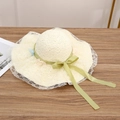 Cream straw sun hat featuring delicate white lace trim and a soft green ribbon bow - No Flower Green Ribbon - Creamy White