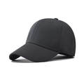 Detail view of a charcoal grey baseball cap showing textured fabric and stitching - Gray