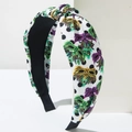 Cerchietto a nodo chic per Carnevale con maschere colorate e stampa a pois neri - Bianco