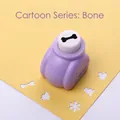 Purple craft hole puncher with bone pattern icon for DIY scrapbooking projects - Cartoon Series: Bone