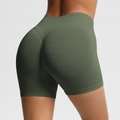 Close-up of seamless high waist fitness shorts with scrunch butt lift in olive green - Olive Green