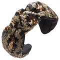 Macro detail of hand-stitched gold and black sequins on the knot of the wide fabric headband - Sequin Knot Style / Leopard Print