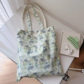 Vista dettagliata della borsa tote in tela con stampa floreale ed elefante verde - Elefante Foglia Verde