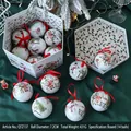 Set de 14 bolas de Navidad con motivos de Papá Noel en una caja hexagonal - Papá Noel y Muñeco de nieve