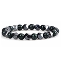 Braided bracelet with dark green beads and faceted hematite stones on white background - Green Sandstone (Style 2) & Hematite