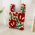 Chic knit handbag featuring vibrant red tulip patterns on a cream white base - Red Tulip