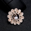 Champagne cat eye stone flower brooch with pearl and peacock motif in gold finish - Peacock Opal