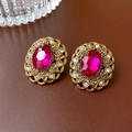 Vintage gold earrings with rose red oval gemstone and tiny diamonds on brown leather - Silver Earring Post Rose Red Gemstone Filigree Stud Earrings