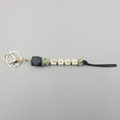 Silicone bead keychain with MAMA lettering, camouflage beads and black geometric detail - Camouflage Green Black Geometric Beads