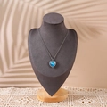 Solid wood display stand featuring a blue heart-shaped crystal pendant necklace - Large / Gray