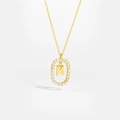 Detail of 18K gold letter M pendant with sparkling oval diamond-set border necklace - Letter M