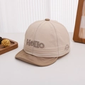 Detail of baby quick-dry cap showing embroidered Hello text and smiley face on soft fabric - 48-50cm (1-2 Years) / Light Khaki