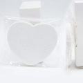 White heart-shaped compressed facial sponges in clear bag and white packaging box - White Heart 70x60x8mm 10 Pcs