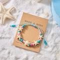 Böhmisches Muschel-Seestern-Perlenarmband mit blauer Kordel für den Sommerurlaub - Seestern & Schildkröte Mehrfarbig Perlen Stil (BR25Y0077)