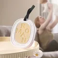 Yellow aromatic wax tablet with Roman engraving and black ribbon for closet scent - Shangri-La - Oval