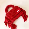 Close-up of handmade red crochet handbag featuring thick cotton tassels and texture - 22*17*5cm / Red