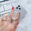 Detail of glitter starry galaxy phone grip with gold stars and crescent moon accents - Transparent Moon & Stars