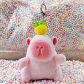 Pink plush capybara keychain with a yellow pineapple topper and silver metal lobster clasp - Pink Pineapple Style + Silver Clip