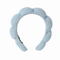 Close-up of light blue braided terry cloth headband with soft sponge texture - Sky Blue Terry Headband