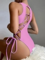 Detail of pink one-piece swimsuit featuring sexy backless criss-cross bandage design - S / Pink