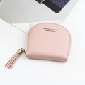 Roze schelpvormige portemonnee met kwastje en Forever Young logo in litchi-patroon - Roze