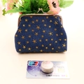 Detail of vintage denim coin purse featuring gold star embroidery and metal clasp - Dark Blue