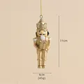 Golden Nutcracker Christmas ornament holding a gift box, 11cm festive tree decoration - Champagne Soldier A (Gift Box)