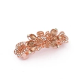 Detail view of rose gold alloy hair clip with champagne crystals in flower design - Style C / Champagne