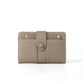 Short leather wallet in mauve with pebble grain texture and snap closure button - Gray