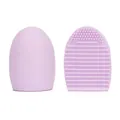 Lavender silicone makeup brush cleaning egg with wave textures and exfoliating bristles - Purple