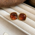 Vintage gold square earrings with amber resin dome in a soft beige jewelry box - Vintage Square Studs (85#) / Gold Amber