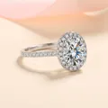 Elegant 925 silver halo ring with oval-cut center stone and pave diamond accents - US 9 / 5*7mm Oval Zirconia