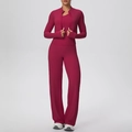 Detail of dark red three-piece yoga set featuring zipper jacket, vest and wide-leg pants - S / Top And Bottom / Carmine