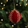 8cm deep red flocked Christmas ball ornament with golden sequins on a festive tree - Leaf Vein Christmas Ball