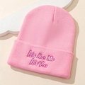 Close-up of pink beanie featuring It's Not Me It's You embroidered text on folded brim - One Size / Pink Embroidered Beanie