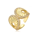 Detail of 18K gold-plated ring with shell shapes and white cubic zirconia accents - Adjustable Open / Gold Double Shell Style (14385)