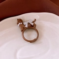 Brown resin dachshund dog ring featuring a rhinestone bow and pearl necklace detail - 47# Ring - Brown - Puppy
