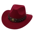 Close-up of burgundy felt cowboy hat featuring leather band with studs and gold emblem - Burgundy