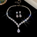 Silver Y-shaped necklace and teardrop earrings set with sparkling zircon and starburst light - Necklace Earrings Set-White