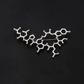 Silver chemical molecule brooch pin in minimalist metal design for clothes - Oxytocin Molecule