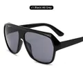 Fashionable oversized black sunglasses with solid grey lenses in glossy resin frame - Black Frame Grey Lens