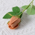 Artificial orange rose bud with green stem and leaves for home decor - Rose Bud (Caramel)