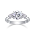 Detailed close-up of a three-stone moissanite ring in 925 sterling silver with round cut - Silver (R13752-8.0mm)