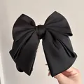 Pinza de banana con lazo grande de satén negro y horquilla vertical para coletas - Pinza de Banana / Negro