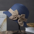 Navy blue woven straw cloche hat with a brown bow accent and a structured foldable design - 58cm(Adjustable) / Navy Blue