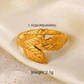 Macro detail of 18K gold-plated adjustable clover leaf ring with weight and size specs - Gold Tree of Life Ring