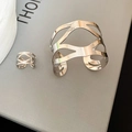 Macro shot of silver irregular cutout metal bracelet and ring set on gift box - Gold 2-Piece Set (Bracelet + Ring)