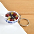 Miniature Chinese red date sweet soup bowl keychain with blue and white floral pattern - Eight Treasure Porridge