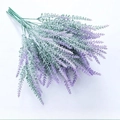 Purple artificial lavender bouquet with white flocking on green stems on white background - Flocked Purple